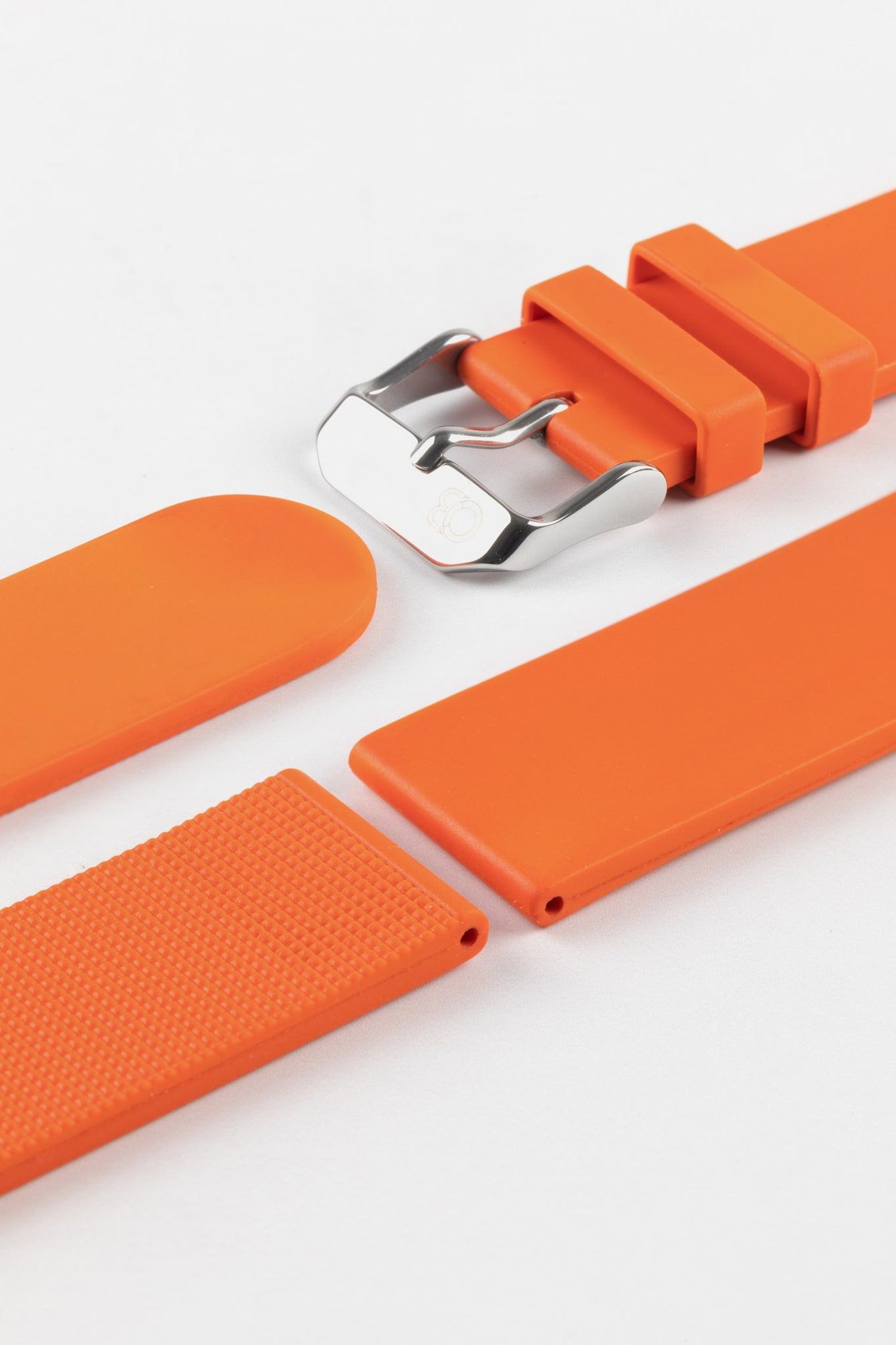 Bucke and Lug end of Orange Bonetto Cinturini 270 Self Punch Rubber Watch Strap with Polished Steel buckle