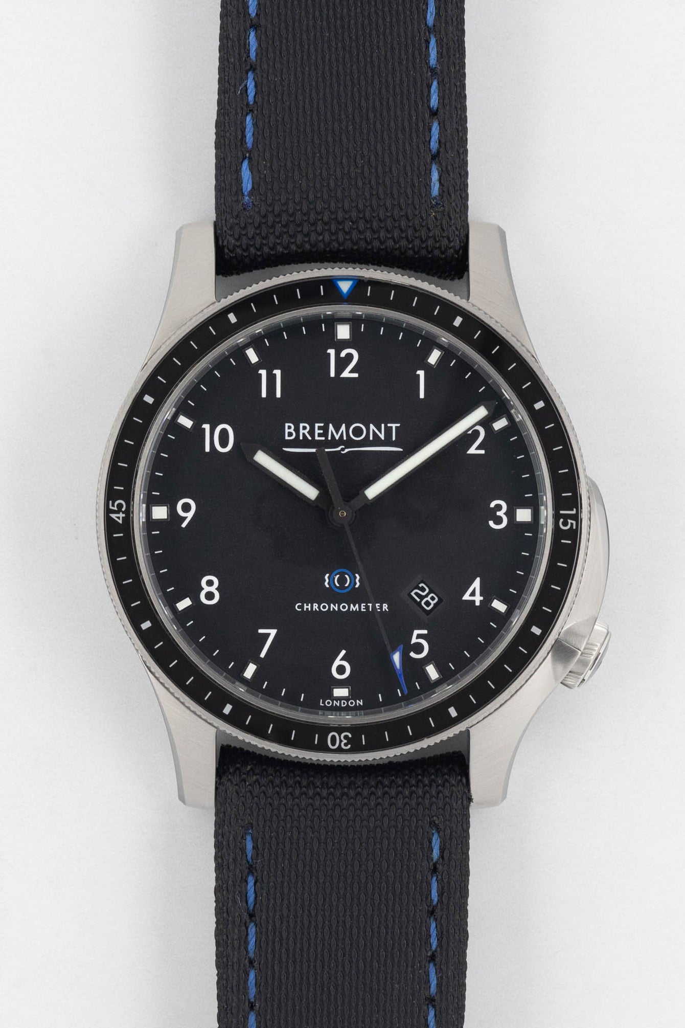 Close up of Bremont Boeing Watch with black dial, date between 4 and 5 o'clock.