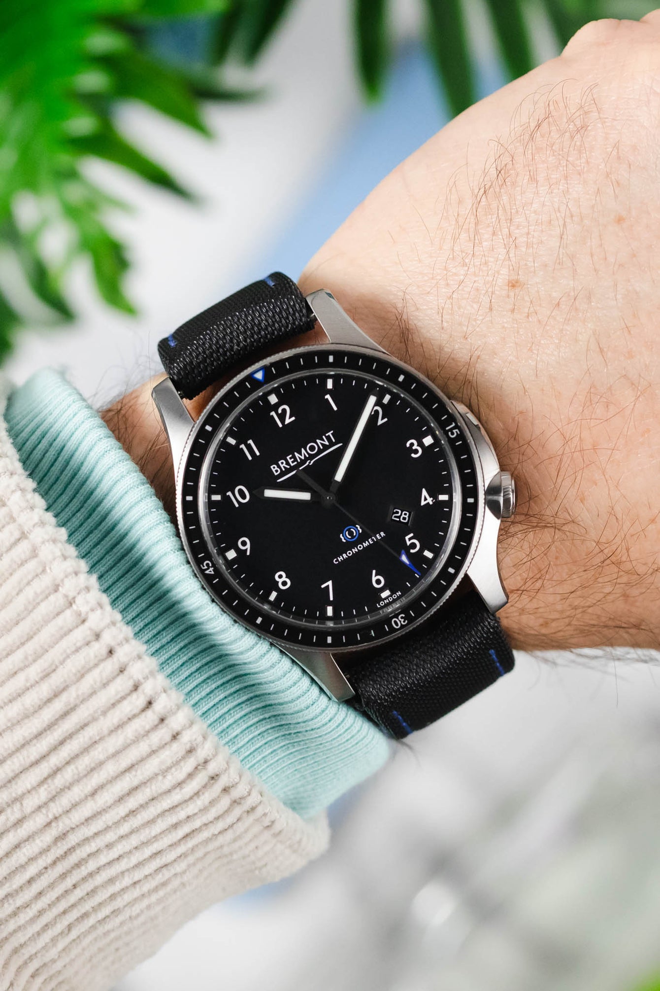 Bremont Model 1 Pilots Watch on a wrist at ten past ten showing brushed case