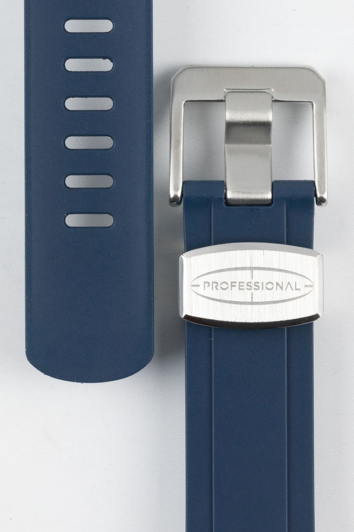 Close up of navy blue Crafter Blue CB10-F rubber dive strap with brushed stainless steel buckle and keeper