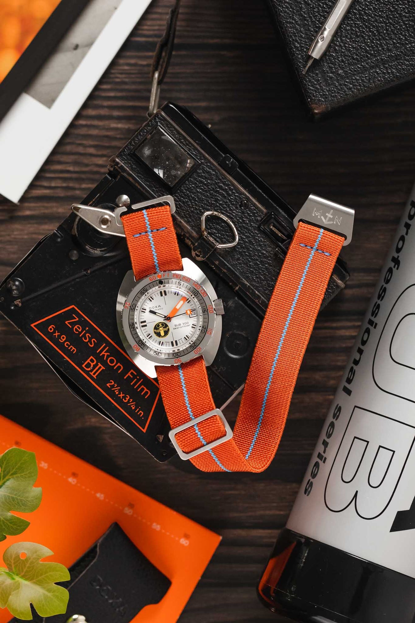 Erika's Originals ORANGE MN™ Strap with TURQUOISE Centerline - BRUSHED Hardware