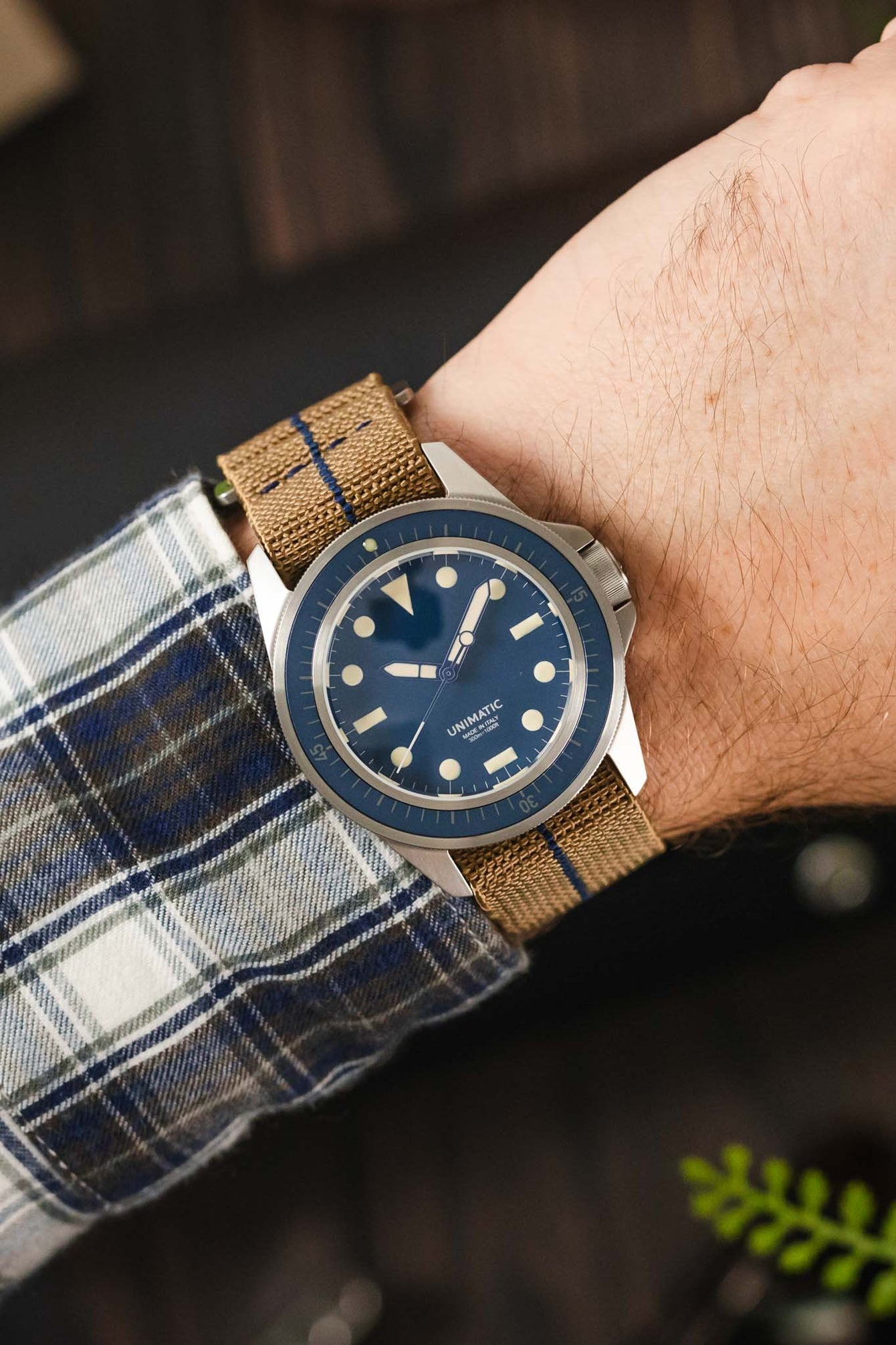 Unimatic U1-MLM Blue Dial watch fitted with Erika's Originals Sahara MN watch strap with navy blue centerline worn on wrist