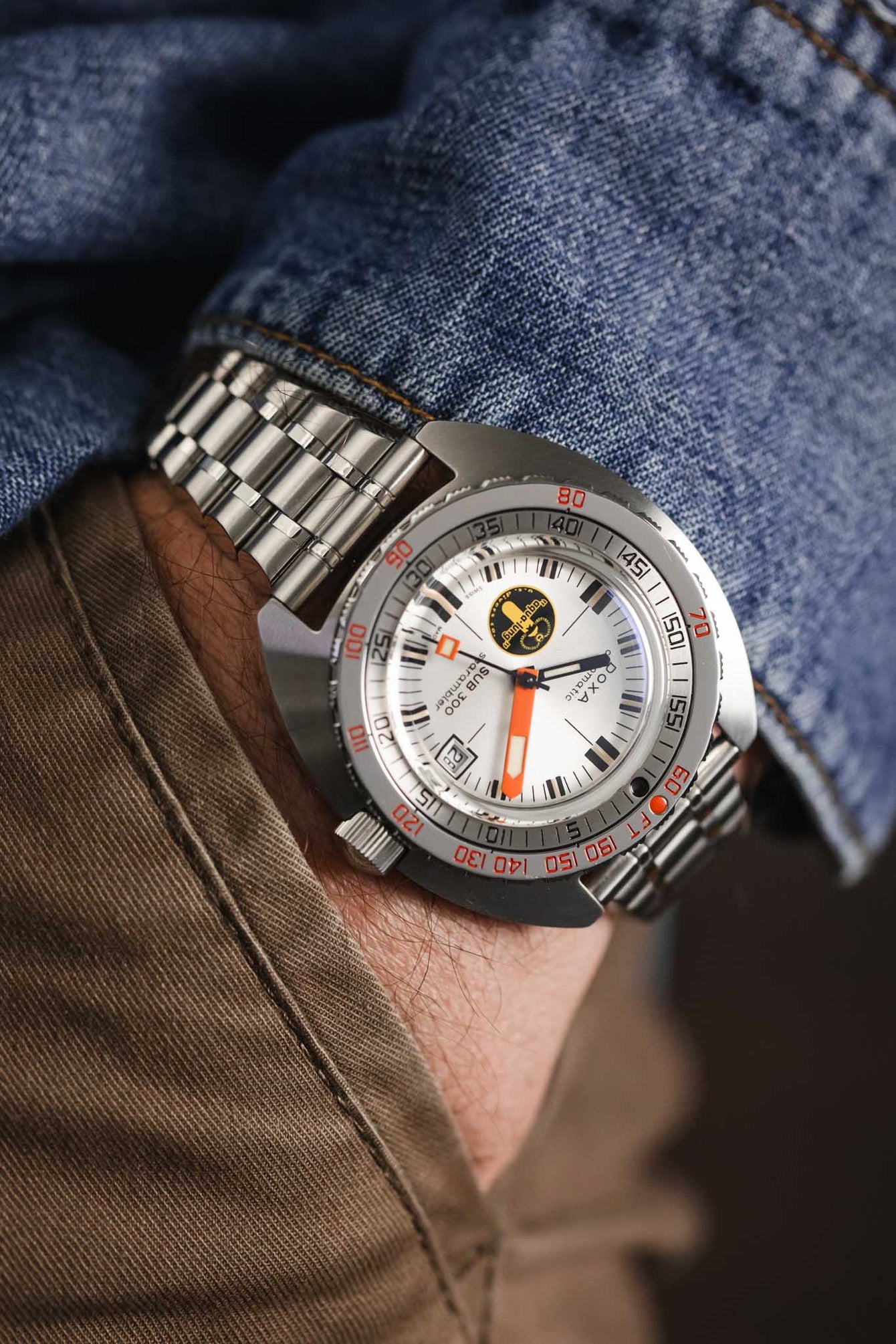 Pocket shot of Doxa on a Forstner Brushed and Polished bullet bracelet with straight lugs