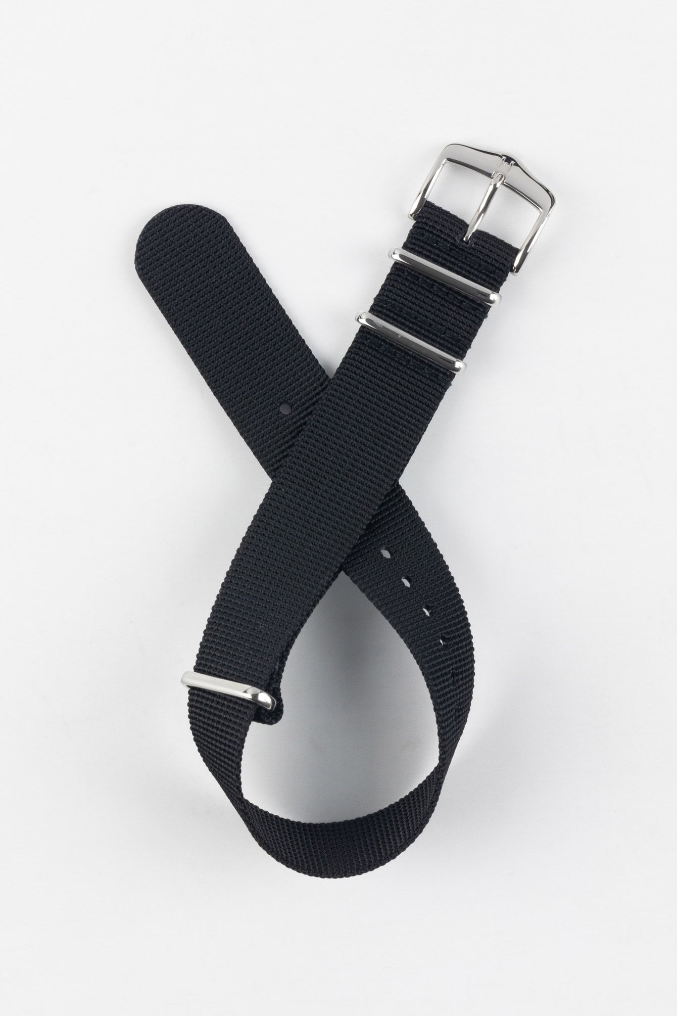 Curved watch strap showing the flexibility of the recycled polyester fabric