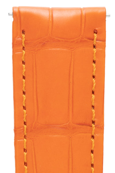 close-up of mens orange alligator watch strap