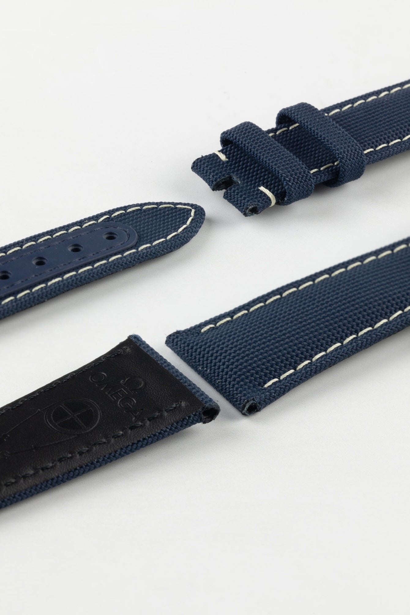 Photo Showing ends of Omega Watch Strap, image shows clasp end, two keepers and tang with the springbar holes. Product code CWZ014510