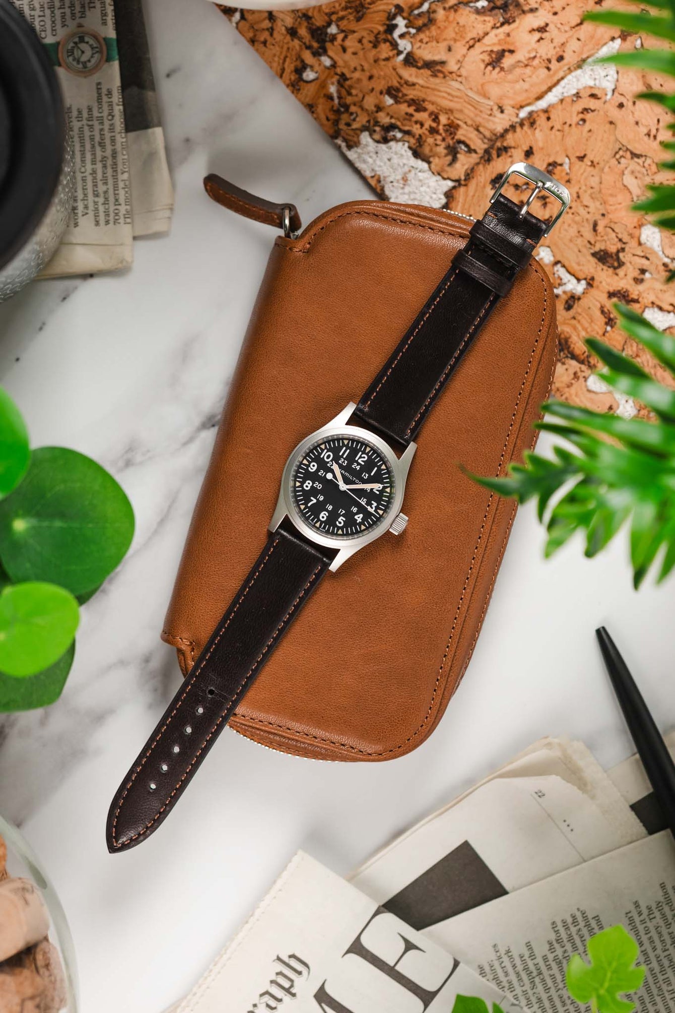 Lay flat image of RIOS1931 Merino Lambskin Leather Watch Strap on Hamilton Khaki Field Watch with black dial