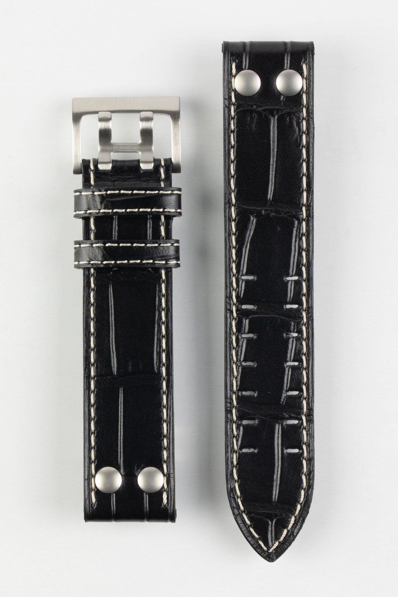 Upper side of Di-Modell Venezuela Pilot Sport Alligator Embossed Calfskin watch strap with brushed buckle in black