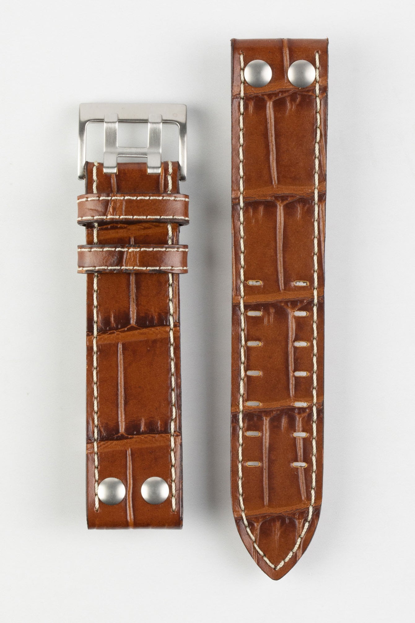 Upper side of Di-Modell Venezuela Pilot Sport Alligator Embossed Calfskin watch strap with brushed buckle in golden brown