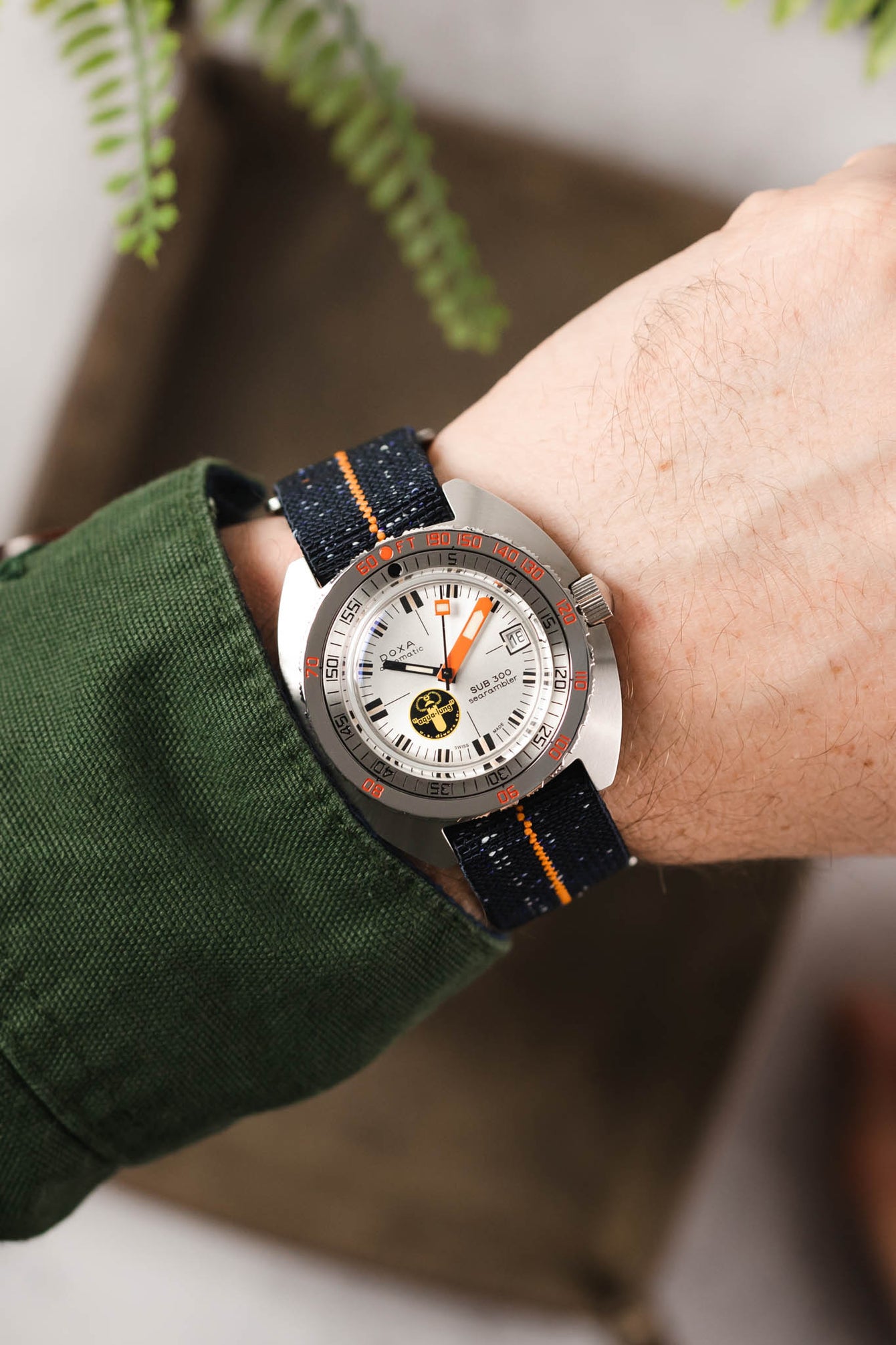 Doxa SUB 300 Searambler Silver Lung Limited Edition fitted with Erika's Originals Indigo Denim with orange centerline on wrist