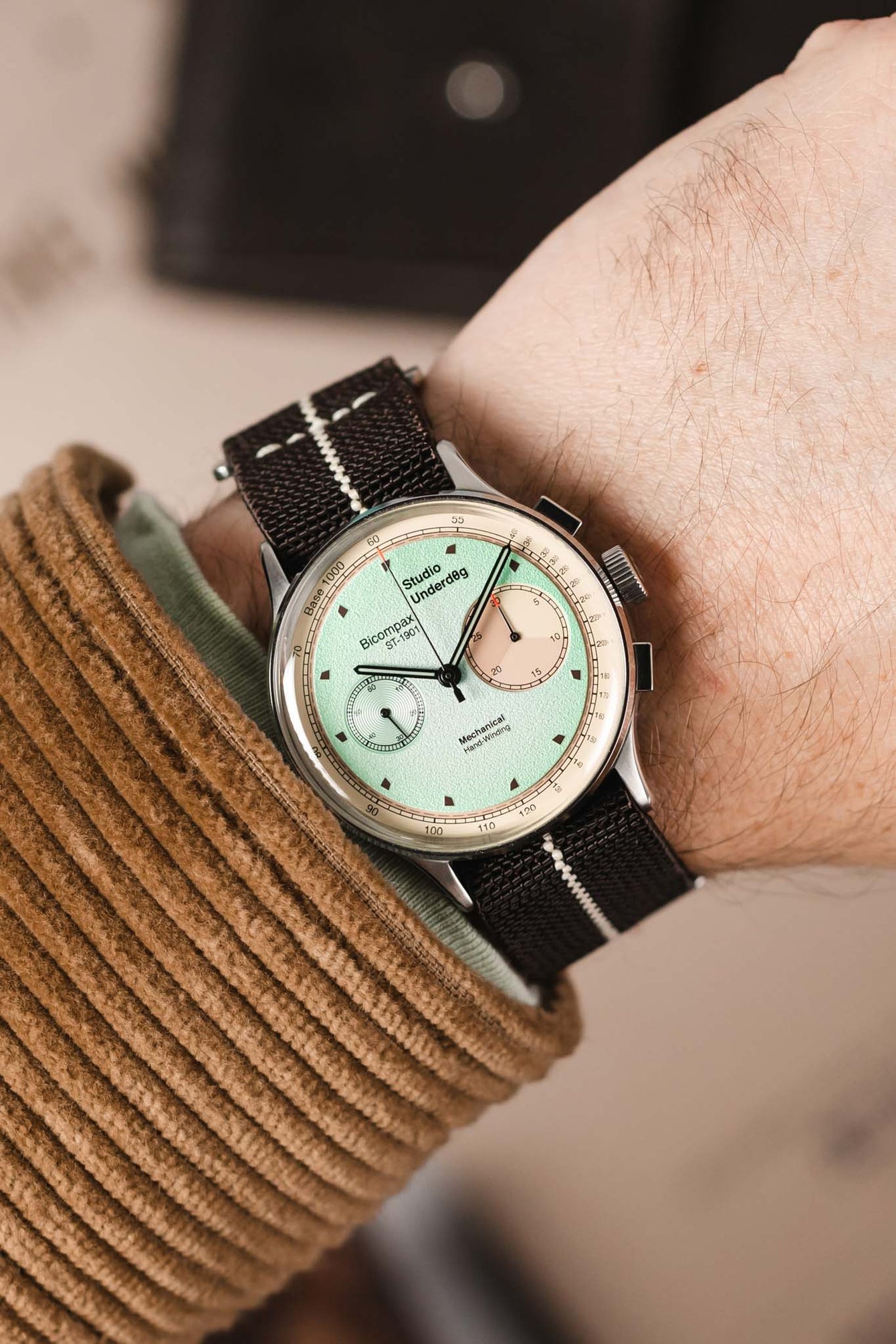 Studio Underd0g Mint Ch0c Chip fitted with Erika's Originals Havana Strap with sand Centerline worn on wrist