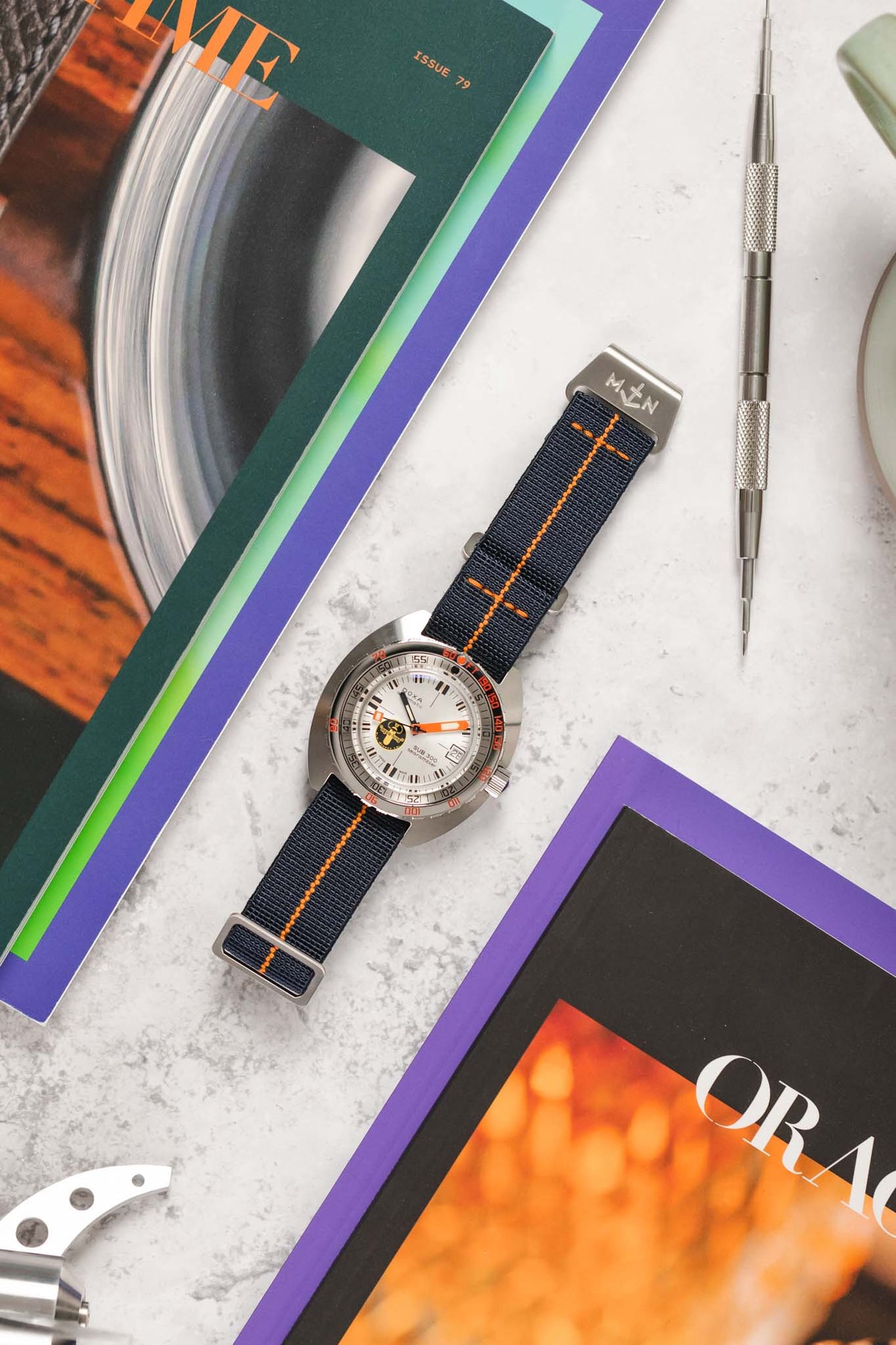 Erika's Originals TRIDENT MN™ Strap with ORANGE Centerline - BRUSHED Hardware