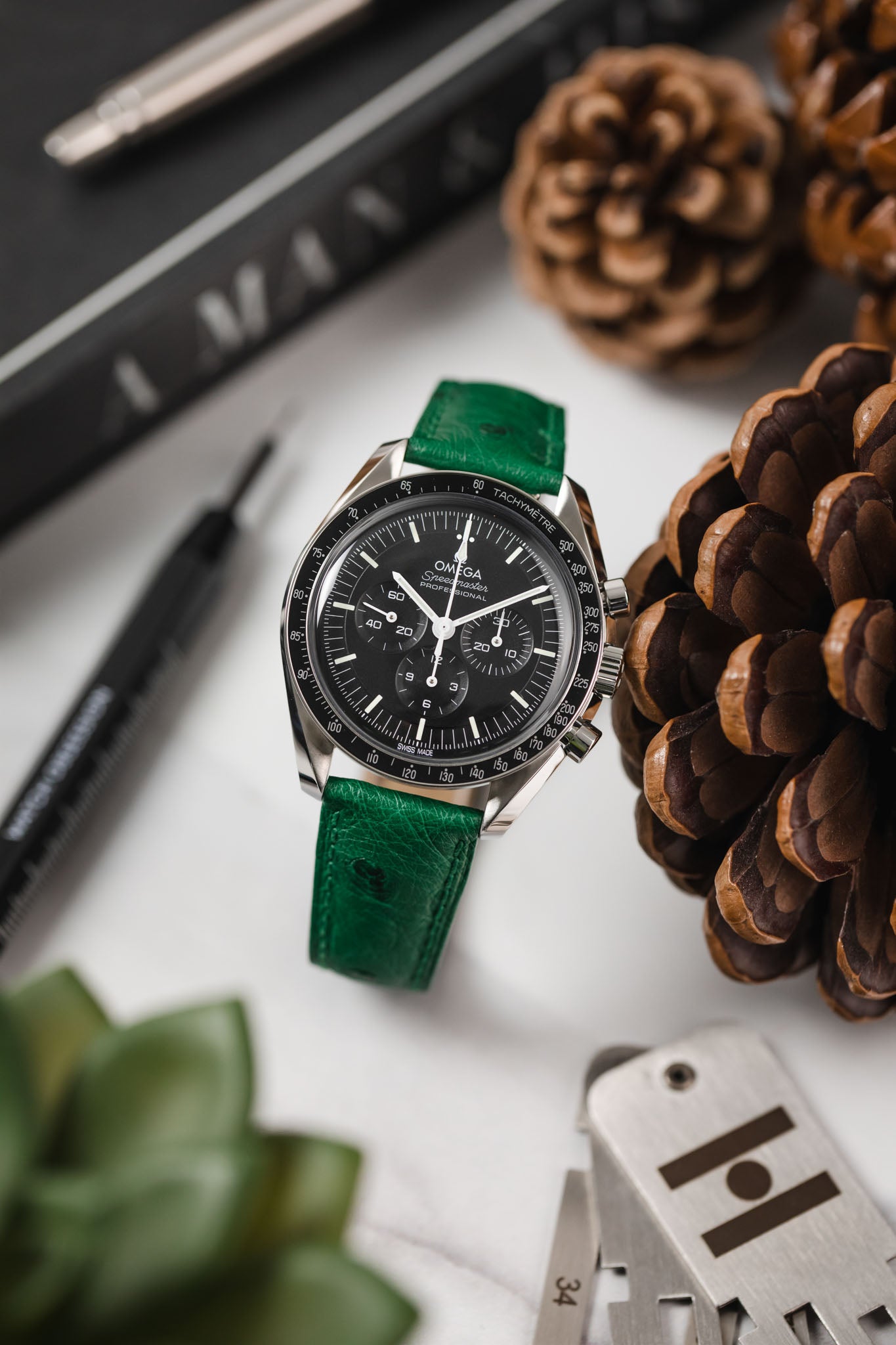 Speedmaster sale green strap