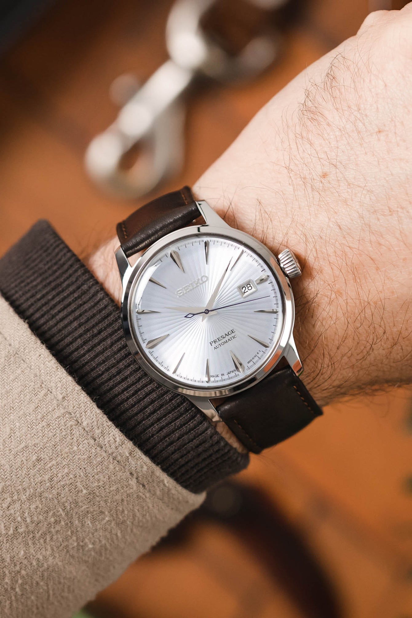 Seiko Presage Cocktail Time fitted with Hirsch Merino Brown leather watch strap worn on wrist